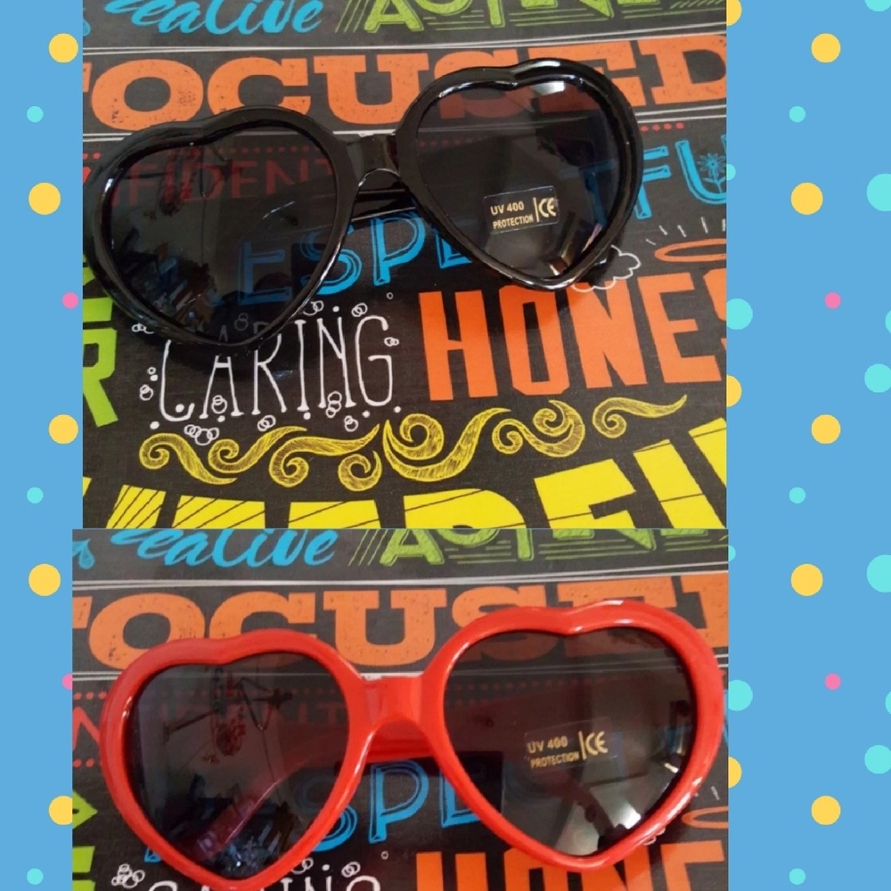 2 pair of heart shaped sunglasses